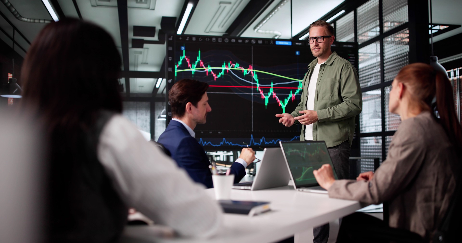 Online Stock Market Trading Presentation: Businesswoman Teaching Diverse Group